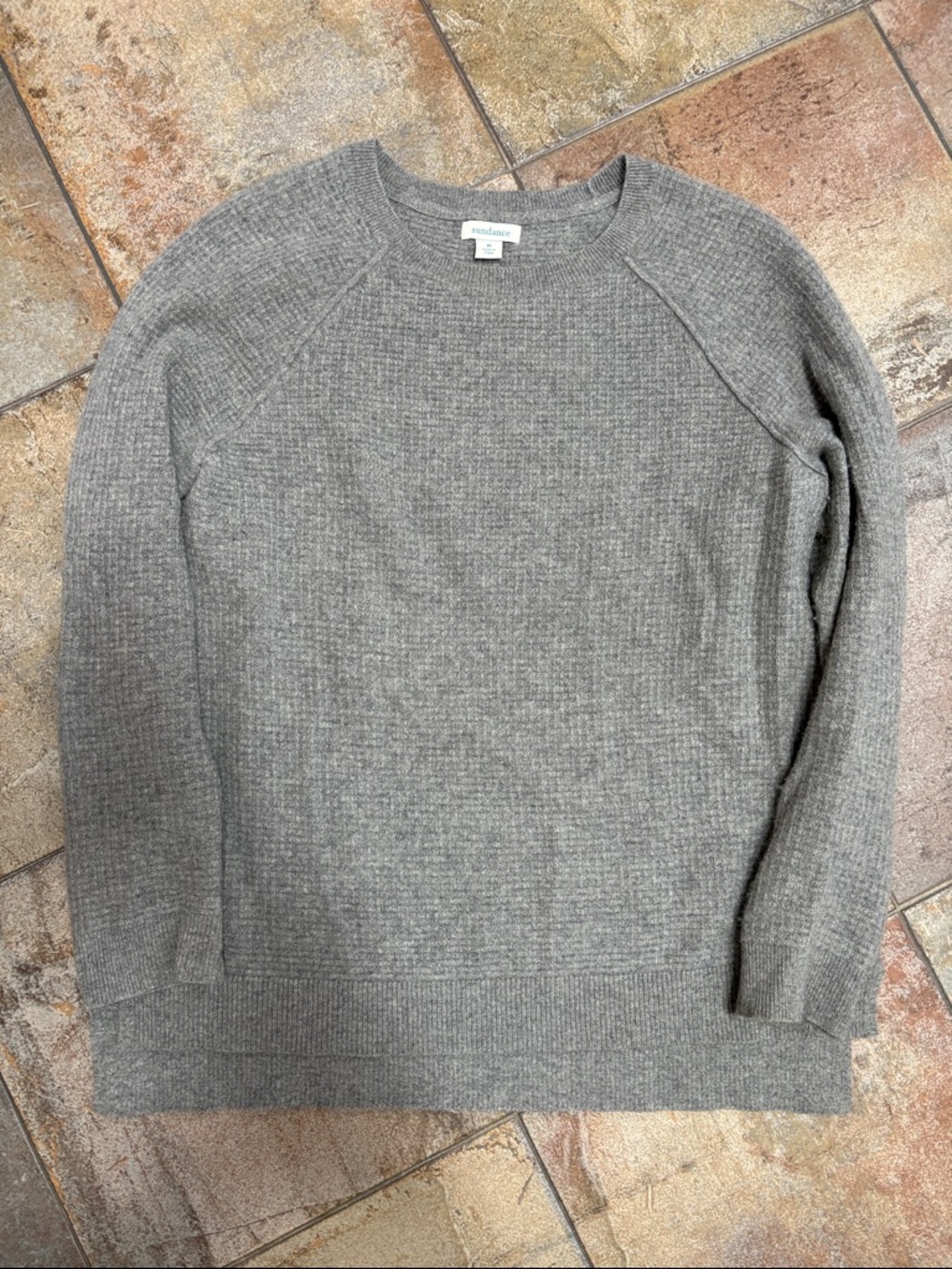 Wool-Blend Gray Crewneck Sweater
It’s cashmere